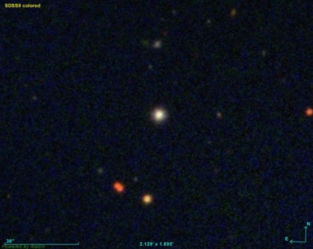 Figure 1: An optical image of the star SDSS J0018-0939, obtained by the Sloan Digital Sky Survey. This is a low-mass star with a mass about half that of the Sun; the distance to this star is about 1000 light years; its location in the sky is close to the constellation Cetus. (Credit: SDSS/NAOJ) Figure 1: An optical image of the star SDSS J0018-0939, obtained by the Sloan Digital Sky Survey. This is a low-mass star with a mass about half that of the Sun; the distance to this star is about 1000 light years; its location in the sky is close to the constellation Cetus. (Credit: SDSS/NAOJ)
