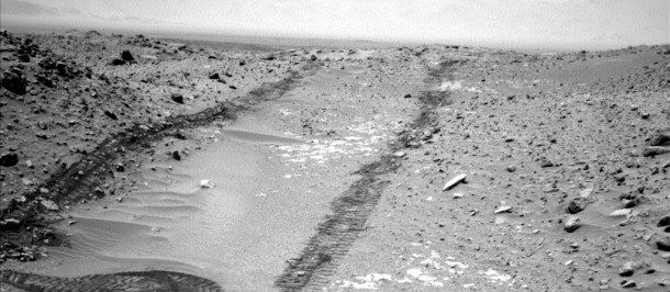 In this image from NASA's Curiosity Mars rover looking up the ramp at the northeastern end of "Hidden Valley," a pale outcrop including drilling target "Bonanza King" is at the center of the scene. The rover's Navcam captured this northward view on Aug. 4, 2014, from the valley's sandy floor. Image Credit: NASA/JPL-Caltech In this image from NASA's Curiosity Mars rover looking up the ramp at the northeastern end of "Hidden Valley," a pale outcrop including drilling target "Bonanza King" is at the center of the scene. The rover's Navcam captured this northward view on Aug. 4, 2014, from the valley's sandy floor. Image Credit: NASA/JPL-Caltech