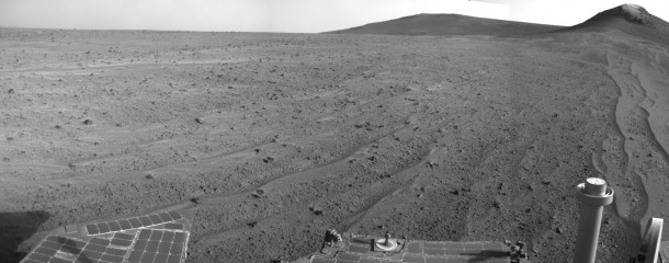 NASA's Mars rover Opportunity captured this view southward just after completing a 338-foot (103-meter) southward drive, in reverse, on Aug. 10, 2014. The foreground of this view from the rover's Navcam includes the rear portion of the rover's deck. The ground beyond bears wind-blown lines of sand. Image Credit: NASA/JPL-Caltech NASA's Mars rover Opportunity captured this view southward just after completing a 338-foot (103-meter) southward drive, in reverse, on Aug. 10, 2014. The foreground of this view from the rover's Navcam includes the rear portion of the rover's deck. The ground beyond bears wind-blown lines of sand. Image Credit: NASA/JPL-Caltech