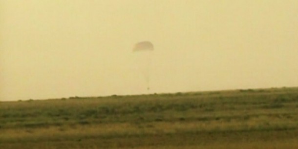 The Soyuz TMA-14M spacecraft carrying the Expedition 40 trio is seconds away from landing on time in Kazakhstan. Image Credit: NASA TV The Soyuz TMA-14M spacecraft carrying the Expedition 40 trio is seconds away from landing on time in Kazakhstan. Image Credit: NASA TV