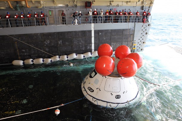 The Orion boilerplate test vehicle was tethered and guided back into the well deck of the USS Anchorage during Underway Recovery Test 3 in the Pacific Ocean on Sept. 17. Image Credit: NASA/Kim Shiflett The Orion boilerplate test vehicle was tethered and guided back into the well deck of the USS Anchorage during Underway Recovery Test 3 in the Pacific Ocean on Sept. 17. Image Credit: NASA/Kim Shiflett