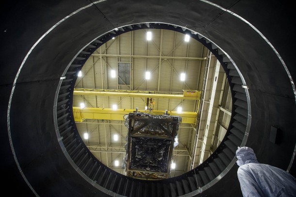 The view from inside NASA Goddard's Thermal Vacuum Chamber shows the JWST heart being lifted out by crane, after completing weeks of space environment testing. Image Credit: NASA/Chris Gunn The view from inside NASA Goddard's Thermal Vacuum Chamber shows the JWST heart being lifted out by crane, after completing weeks of space environment testing. Image Credit: NASA/Chris Gunn