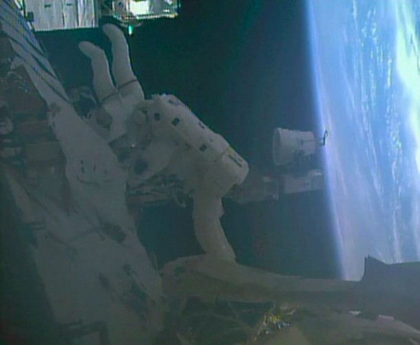 Flight Engineers Barry Wilmore (foreground) and Reid Wiseman get set to perform their next set of tasks during Wednesday's spacewalk outside the International Space Station. Image Credit: NASA TV Flight Engineers Barry Wilmore (foreground) and Reid Wiseman get set to perform their next set of tasks during Wednesday's spacewalk outside the International Space Station. Image Credit: NASA TV