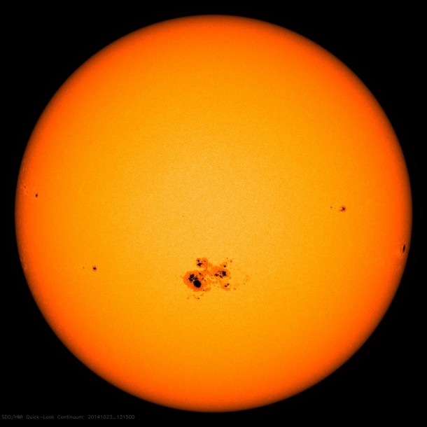 A gigantic sunspot – almost 80,000 miles across --can be seen on the lower center of the sun in this image from NASA’s Solar Dynamic Observatory captured on Oct. 23, 2014. This active region is the largest of the current solar cycle. Image Credit: NASA/SDO A gigantic sunspot – almost 80,000 miles across --can be seen on the lower center of the sun in this image from NASA’s Solar Dynamic Observatory captured on Oct. 23, 2014. This active region is the largest of the current solar cycle. Image Credit: NASA/SDO