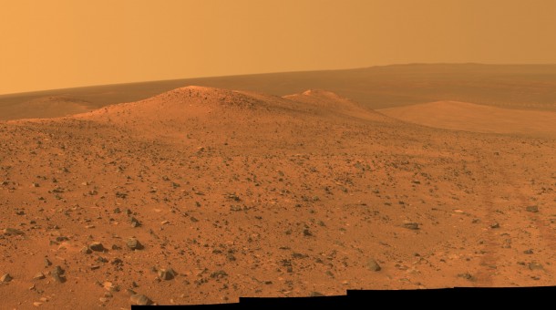 This vista from NASA's Mars Exploration Rover Opportunity shows "Wdowiak Ridge," from left foreground to center, as part of a northward look with the rover's tracks visible at right. Opportunity's panoramic camera (Pancam) recorded the component images for this mosaic on Sept. 17, 2014. Image Credit: NASA/JPL-Caltech/Cornell Univ./Arizona State Univ. This vista from NASA's Mars Exploration Rover Opportunity shows "Wdowiak Ridge," from left foreground to center, as part of a northward look with the rover's tracks visible at right. Opportunity's panoramic camera (Pancam) recorded the component images for this mosaic on Sept. 17, 2014. Image Credit: NASA/JPL-Caltech/Cornell Univ./Arizona State Univ.