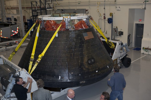 NASA's Orion spacecraft is viewed by members of the media at the Launch Abort System Facility at NASA's Kennedy Space Center in Florida. Orion made the 8-day, 2,700 mile overland trip back to Kennedy from Naval Base San Diego in California. Analysis of date obtained during its two-orbit, four-and-a-half hour mission Dec. 5 will provide engineers detailed information on how the spacecraft fared. The Ground Systems Development and Operations Program led the recovery, offload and transportation efforts. Image Credit: NASA/Dimitri Gerondidakis NASA's Orion spacecraft is viewed by members of the media at the Launch Abort System Facility at NASA's Kennedy Space Center in Florida. Orion made the 8-day, 2,700 mile overland trip back to Kennedy from Naval Base San Diego in California. Analysis of date obtained during its two-orbit, four-and-a-half hour mission Dec. 5 will provide engineers detailed information on how the spacecraft fared. The Ground Systems Development and Operations Program led the recovery, offload and transportation efforts. Image Credit: NASA/Dimitri Gerondidakis