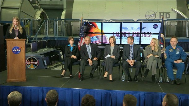 NASA's Stephanie Schierholz introduces the panel of Johnson Space Center Director Dr. Ellen Ochoa, seated, left, NASA Administrator Charles Bolden, Commercial Crew Program Manager Kathy Lueders, Boeing's John Elbon, SpaceX's Gwynne Shotwell and NASA astronaut Mike Fincke. Image Credit: NASA TV NASA's Stephanie Schierholz introduces the panel of Johnson Space Center Director Dr. Ellen Ochoa, seated, left, NASA Administrator Charles Bolden, Commercial Crew Program Manager Kathy Lueders, Boeing's John Elbon, SpaceX's Gwynne Shotwell and NASA astronaut Mike Fincke. Image Credit: NASA TV