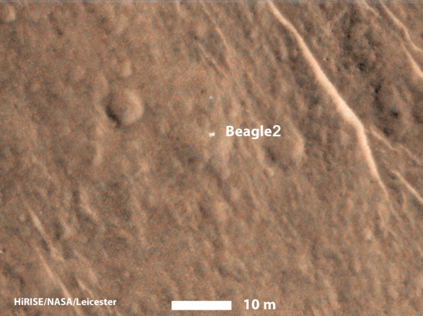 This annotated image from NASA's Mars Reconnaissance Orbiter shows a bright feature interpreted as the United Kingdom's Beagle 2 Lander, which was never heard from after its expected Dec. 25, 2003, landing. The image was taken by the orbiter's HiRISE camera on Dec. 15, 2014. Image Credit: NASA/JPL-Caltech/Univ. of Arizona/University of Leicester This annotated image from NASA's Mars Reconnaissance Orbiter shows a bright feature interpreted as the United Kingdom's Beagle 2 Lander, which was never heard from after its expected Dec. 25, 2003, landing. The image was taken by the orbiter's HiRISE camera on Dec. 15, 2014. Image Credit: NASA/JPL-Caltech/Univ. of Arizona/University of Leicester