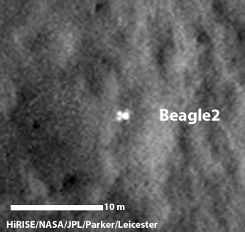 A configuration interpreted as the United Kingdom's Beagle 2 Lander, with solar panels at least partially deployed, is indicated in this composite of two images from the High Resolution Imaging Science Experiment (HiRISE) camera on NASA's Mars Reconnaissance Orbiter. Image Credit: NASA/JPL-Caltech/Univ. of Arizona/University of Leicester A configuration interpreted as the United Kingdom's Beagle 2 Lander, with solar panels at least partially deployed, is indicated in this composite of two images from the High Resolution Imaging Science Experiment (HiRISE) camera on NASA's Mars Reconnaissance Orbiter. Image Credit: NASA/JPL-Caltech/Univ. of Arizona/University of Leicester