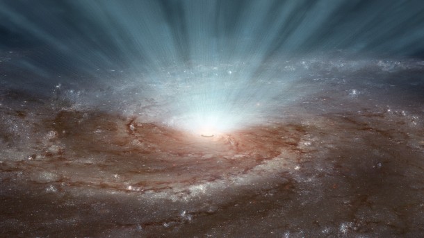 Supermassive black holes at the cores of galaxies blast out radiation and ultra-fast winds, as illustrated in this artist's conception. NASA's NuSTAR and ESA's XMM-Newton telescopes show that these winds, containing highly ionized atoms, blow in a nearly spherical fashion. Image Credit: NASA/JPL-Caltech Supermassive black holes at the cores of galaxies blast out radiation and ultra-fast winds, as illustrated in this artist's conception. NASA's NuSTAR and ESA's XMM-Newton telescopes show that these winds, containing highly ionized atoms, blow in a nearly spherical fashion. Image Credit: NASA/JPL-Caltech