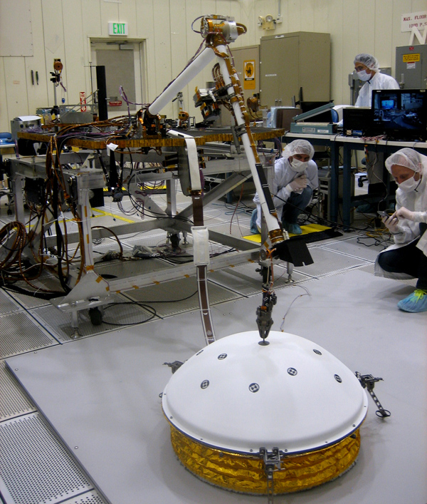In the weeks after NASA's InSight mission reaches Mars in September 2016, the lander's arm will lift two science instruments off the deck and place them onto the ground. Credit: NASA/JPL-Caltech In the weeks after NASA's InSight mission reaches Mars in September 2016, the lander's arm will lift two science instruments off the deck and place them onto the ground. Credit: NASA/JPL-Caltech
