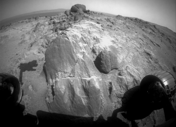 The flat-faced rock near the center of this image is a target for contact investigation by NASA's Mars Exploration Rover Opportunity in early March 2015. The flat-faced rock near the center of this image is a target for contact investigation by NASA's Mars Exploration Rover Opportunity in early March 2015.
