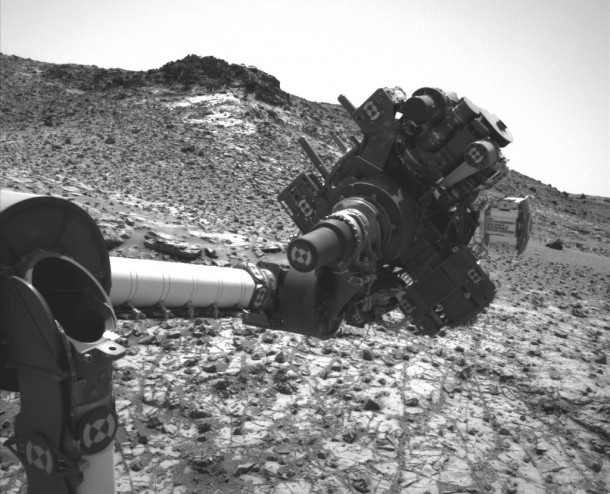 This March 4, 2015, image from the Navcam on NASA's Curiosity Mars rover shows the position in which the rover held its arm for several days after a transient short circuit triggered onboard fault-protection programming to halt arm activities on Feb. 27. Image Credit: NASA/JPL-Caltech/MSSS This March 4, 2015, image from the Navcam on NASA's Curiosity Mars rover shows the position in which the rover held its arm for several days after a transient short circuit triggered onboard fault-protection programming to halt arm activities on Feb. 27. Image Credit: NASA/JPL-Caltech/MSSS