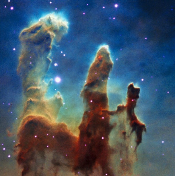 This colour view was created from observations of the Pillars of Creation made with the MUSE instrument on ESO’s Very Large Telescope. The parts of the three-dimensional MUSE data cube that correspond to emission from different chemical elements in the clouds have been extracted and combined to create this colour view of the region. Credit: ESO This colour view was created from observations of the Pillars of Creation made with the MUSE instrument on ESO’s Very Large Telescope. The parts of the three-dimensional MUSE data cube that correspond to emission from different chemical elements in the clouds have been extracted and combined to create this colour view of the region. Credit: ESO