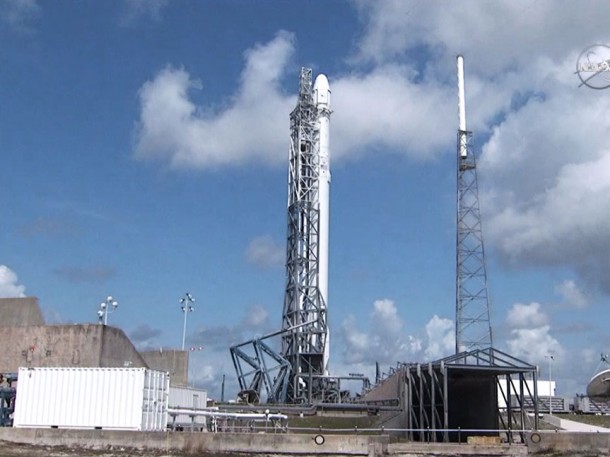 The SpaceX Falcon 9 rocket with the Dragon space freighter attached at the top rests at its launch pad at the Cape Canaveral Air Force Station, Florida. Credit: NASA TV The SpaceX Falcon 9 rocket with the Dragon space freighter attached at the top rests at its launch pad at the Cape Canaveral Air Force Station, Florida. Credit: NASA TV
