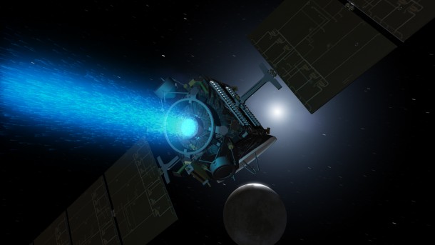 Artist's concept of Dawn above Ceres around the time it was captured into orbit by the dwarf planet in early March. Since its arrival, the spacecraft turned around to point the blue glow of its ion engine in the opposite direction. Image credit: NASA/JPL Artist's concept of Dawn above Ceres around the time it was captured into orbit by the dwarf planet in early March. Since its arrival, the spacecraft turned around to point the blue glow of its ion engine in the opposite direction. Image credit: NASA/JPL