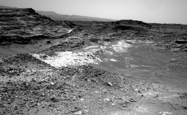 The Martian outcrop where pale rock meets darker overlying rock near the middle of this May 21, 2015, view is an example of a geological contact. Such contacts can reveal clues about how environmental conditions that produced one type of rock were related to conditions that produced the other. Credit: NASA/JPL-Caltech The Martian outcrop where pale rock meets darker overlying rock near the middle of this May 21, 2015, view is an example of a geological contact. Such contacts can reveal clues about how environmental conditions that produced one type of rock were related to conditions that produced the other. Credit: NASA/JPL-Caltech