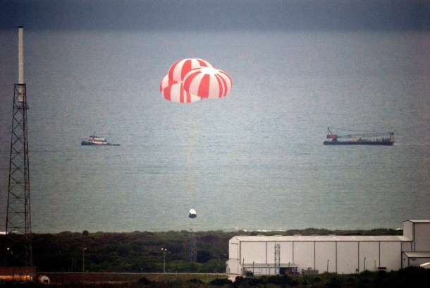 SpaceX's Crew Dragon spacecraft splashed down in the Atlantic Ocean under three main parachutes following a successful test on May 6, 2015 of the spacecraft's ability to save astronauts in the unlikely event of a life-threatening situation on the launch pad. Credits: NAS SpaceX's Crew Dragon spacecraft splashed down in the Atlantic Ocean under three main parachutes following a successful test on May 6, 2015 of the spacecraft's ability to save astronauts in the unlikely event of a life-threatening situation on the launch pad. Credits: NAS