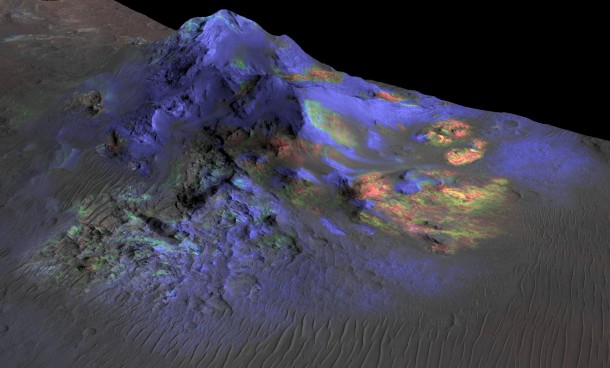 Researchers have found deposits of impact glass (in green) preserved in Martian craters, including Alga Crater, shown here. The detection is based on data from the instrument Compact Reconnaissance Imaging Spectrometer for Mars (CRISM) on NASA's Mars Reconnaissance Orbiter. Credits: NASA/JPL-Caltech/JHUAPL/Univ. of Arizona Researchers have found deposits of impact glass (in green) preserved in Martian craters, including Alga Crater, shown here. The detection is based on data from the instrument Compact Reconnaissance Imaging Spectrometer for Mars (CRISM) on NASA's Mars Reconnaissance Orbiter. Credits: NASA/JPL-Caltech/JHUAPL/Univ. of Arizona
