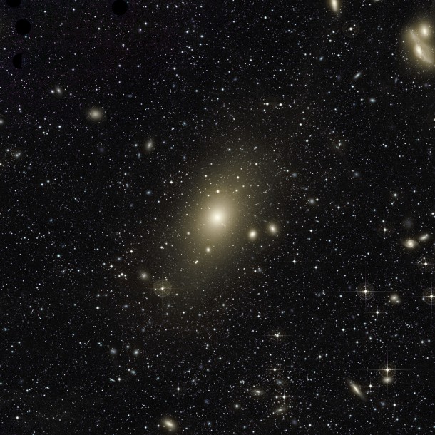 The huge halo around giant elliptical galaxy Messier 87 appears on this very deep image. An excess of light in the top-right part of this halo, and the motion of planetary nebulae in the galaxy, are the last remaining signs of a medium-sized galaxy that recently collided with Messier 87. The image also reveals many other galaxies forming the Virgo Cluster, of which Messier 87 is the largest member. In particular, the two galaxies at the top right of the frame are nicknamed "the Eyes". Credit: Chris Mihos (Case Western Reserve University)/ESO The huge halo around giant elliptical galaxy Messier 87 appears on this very deep image. An excess of light in the top-right part of this halo, and the motion of planetary nebulae in the galaxy, are the last remaining signs of a medium-sized galaxy that recently collided with Messier 87. The image also reveals many other galaxies forming the Virgo Cluster, of which Messier 87 is the largest member. In particular, the two galaxies at the top right of the frame are nicknamed "the Eyes". Credit: Chris Mihos (Case Western Reserve University)/ESO