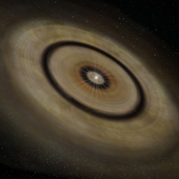 Figure 2: Artist rendition of the TW Hydrae showing double ringed structure with flare up toward the outer edge. (Credit: NAOJ) Figure 2: Artist rendition of the TW Hydrae showing double ringed structure with flare up toward the outer edge. (Credit: NAOJ)