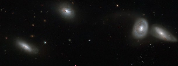 This new NASA/ESA Hubble Space Telescope image shows four of the seven members of galaxy group HCG 16. Credit: NASA, ESA, ESO. Acknowledgement: Jane Charlton (Pennsylvania State University, USA) This new NASA/ESA Hubble Space Telescope image shows four of the seven members of galaxy group HCG 16. Credit: NASA, ESA, ESO. Acknowledgement: Jane Charlton (Pennsylvania State University, USA)