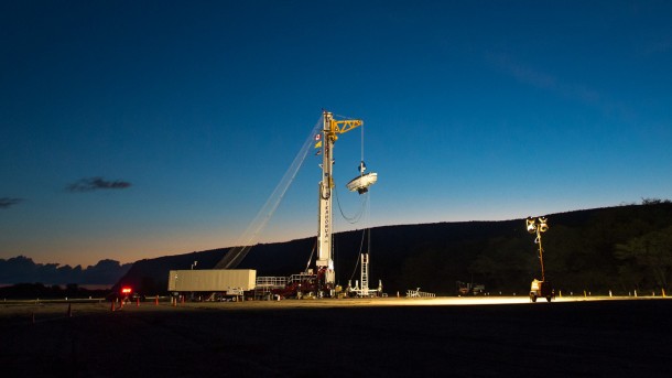 NASA's Low-Density Supersonic Decelerator hangs from a launch tower at U.S. Navy's Pacific Missile Range Facility in Kauai, Hawaii. The saucer-shaped vehicle will test two devices for landing heavy payloads on Mars: an inflatable donut-shaped device and a supersonic parachute. The launch tower helps link the vehicle to a balloon; once the balloon floats up, the vehicle is released from the tower and the balloon carries it to high altitudes. The vehicle's rocket takes it to even higher altitudes, to the top of the stratosphere, where the supersonic test begins. Credits: NASA/Bill Ingalls NASA's Low-Density Supersonic Decelerator hangs from a launch tower at U.S. Navy's Pacific Missile Range Facility in Kauai, Hawaii. The saucer-shaped vehicle will test two devices for landing heavy payloads on Mars: an inflatable donut-shaped device and a supersonic parachute. The launch tower helps link the vehicle to a balloon; once the balloon floats up, the vehicle is released from the tower and the balloon carries it to high altitudes. The vehicle's rocket takes it to even higher altitudes, to the top of the stratosphere, where the supersonic test begins. Credits: NASA/Bill Ingalls