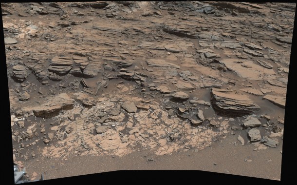 This May 25, 2015, view from the Curiosity rover's Mastcam shows a site where two different types of bedrock meet near "Marias Pass" on Mount Sharp. Pale mudstone in the foreground is like bedrock the rover studied at "Pahrump Hills." The darker sandstone above it is called the Stimson unit. Image credit: NASA/JPL-Caltech/MSSS This May 25, 2015, view from the Curiosity rover's Mastcam shows a site where two different types of bedrock meet near "Marias Pass" on Mount Sharp. Pale mudstone in the foreground is like bedrock the rover studied at "Pahrump Hills." The darker sandstone above it is called the Stimson unit. Image credit: NASA/JPL-Caltech/MSSS