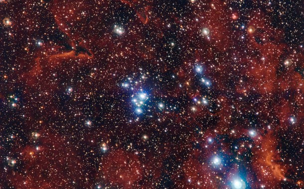 This rich view of an array of colourful stars and gas was captured by the Wide Field Imager (WFI) camera, on the MPG/ESO 2.2-metre telescope at ESO’s La Silla Observatory in Chile. It shows a young open cluster of stars known as NGC 2367, an infant stellar grouping that lies at the centre of an immense and ancient structure on the margins of the Milky Way. Credit: ESO/G. Beccari This rich view of an array of colourful stars and gas was captured by the Wide Field Imager (WFI) camera, on the MPG/ESO 2.2-metre telescope at ESO’s La Silla Observatory in Chile. It shows a young open cluster of stars known as NGC 2367, an infant stellar grouping that lies at the centre of an immense and ancient structure on the margins of the Milky Way. Credit: ESO/G. Beccari