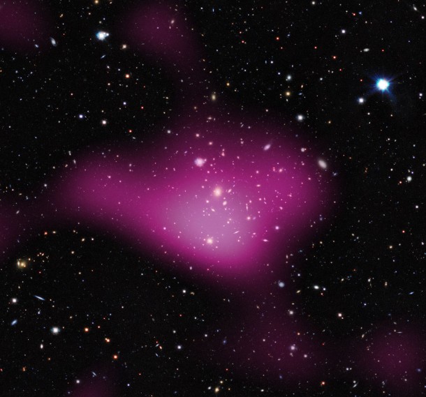 Here the invisible dark matter is seen rendered in pink on top of the visible-light image. Credit: Kilo-Degree Survey Collaboration/A. Tudorica & C. Heymans/ESO Here the invisible dark matter is seen rendered in pink on top of the visible-light image. Credit: Kilo-Degree Survey Collaboration/A. Tudorica & C. Heymans/ESO