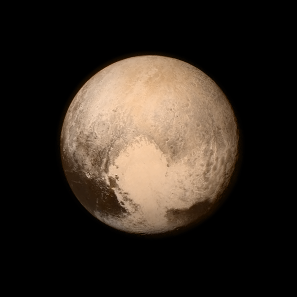 Pluto nearly fills the frame in this image from the Long Range Reconnaissance Imager (LORRI) aboard NASA’s New Horizons spacecraft, taken on July 13, 2015 when the spacecraft was 476,000 miles (768,000 kilometers) from the surface. This is the last and most detailed image sent to Earth before the spacecraft’s closest approach to Pluto on July 14. The color image has been combined with lower-resolution color information from the Ralph instrument that was acquired earlier on July 13. This view is dominated by the large, bright feature informally named the “heart,” which measures approximately 1,000 miles (1,600 kilometers) across. The heart borders darker equatorial terrains, and the mottled terrain to its east (right) are complex. However, even at this resolution, much of the heart’s interior appears remarkably featureless—possibly a sign of ongoing geologic processes. Credits: NASA/APL/SwRI Pluto nearly fills the frame in this image from the Long Range Reconnaissance Imager (LORRI) aboard NASA’s New Horizons spacecraft, taken on July 13, 2015 when the spacecraft was 476,000 miles (768,000 kilometers) from the surface. This is the last and most detailed image sent to Earth before the spacecraft’s closest approach to Pluto on July 14. The color image has been combined with lower-resolution color information from the Ralph instrument that was acquired earlier on July 13. This view is dominated by the large, bright feature informally named the “heart,” which measures approximately 1,000 miles (1,600 kilometers) across. The heart borders darker equatorial terrains, and the mottled terrain to its east (right) are complex. However, even at this resolution, much of the heart’s interior appears remarkably featureless—possibly a sign of ongoing geologic processes. Credits: NASA/APL/SwRI