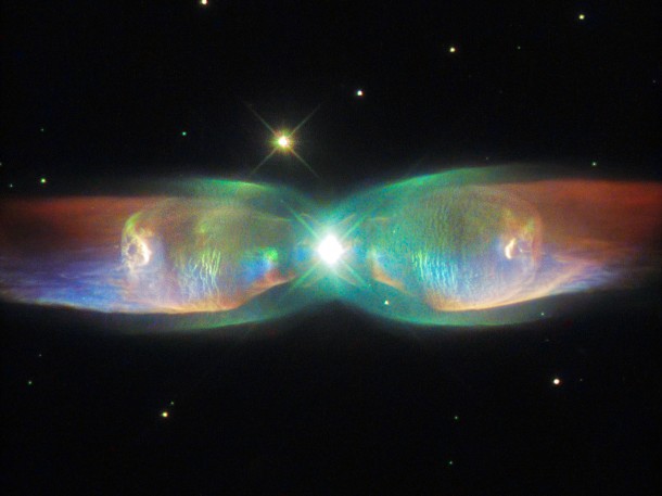 The Twin Jet Nebula, or PN M2-9, is a striking example of a bipolar planetary nebula. Bipolar planetary nebulae are formed when the central object is not a single star, but a binary system, Studies have shown that the nebula’s size increases with time, and measurements of this rate of increase suggest that the stellar outburst that formed the lobes occurred just 1200 years ago. Credit: ESA/Hubble & NASA Acknowledgement: Judy Schmidt The Twin Jet Nebula, or PN M2-9, is a striking example of a bipolar planetary nebula. Bipolar planetary nebulae are formed when the central object is not a single star, but a binary system, Studies have shown that the nebula’s size increases with time, and measurements of this rate of increase suggest that the stellar outburst that formed the lobes occurred just 1200 years ago. Credit: ESA/Hubble & NASA Acknowledgement: Judy Schmidt