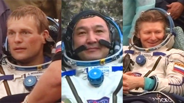 Soyuz TMA-16M crew members (from left) Andreas Mogensen, Aidyn Aimbetov and Gennady Padalka rest outside their spacecraft and are surrounded by support personnel after landing in Kazakhstan. Credit: NASA TV Soyuz TMA-16M crew members (from left) Andreas Mogensen, Aidyn Aimbetov and Gennady Padalka rest outside their spacecraft and are surrounded by support personnel after landing in Kazakhstan. Credit: NASA TV