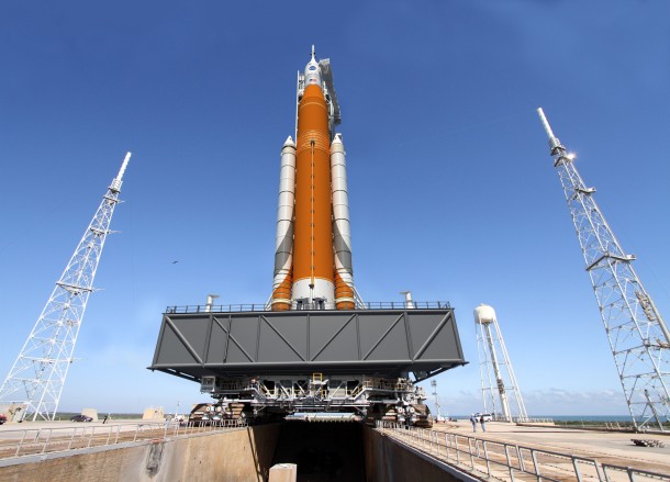 Artist concept of the Block I configuration of NASA’s Space Launch System (SLS). The SLS Program has completed its critical design review, and the program has concluded that the core stage of the rocket will remain orange along with the Launch Vehicle Stage Adapter, which is the natural color of the insulation that will cover those elements. Credits: NASA Artist concept of the Block I configuration of NASA’s Space Launch System (SLS). The SLS Program has completed its critical design review, and the program has concluded that the core stage of the rocket will remain orange along with the Launch Vehicle Stage Adapter, which is the natural color of the insulation that will cover those elements. Credits: NASA