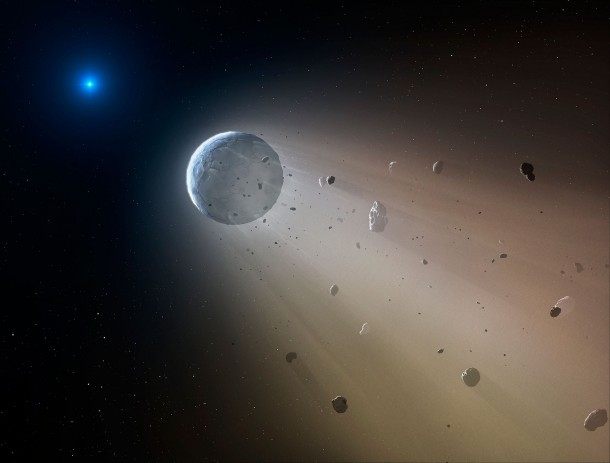 In this artist’s conception, a tiny rocky object vaporizes as it orbits a white dwarf star. Astronomers have detected the first planetary object transiting a white dwarf using data from the K2 mission. Slowly the object will disintegrate, leaving a dusting of metals on the surface of the star. Credits: CfA/Mark A. Garlick In this artist’s conception, a tiny rocky object vaporizes as it orbits a white dwarf star. Astronomers have detected the first planetary object transiting a white dwarf using data from the K2 mission. Slowly the object will disintegrate, leaving a dusting of metals on the surface of the star. Credits: CfA/Mark A. Garlick