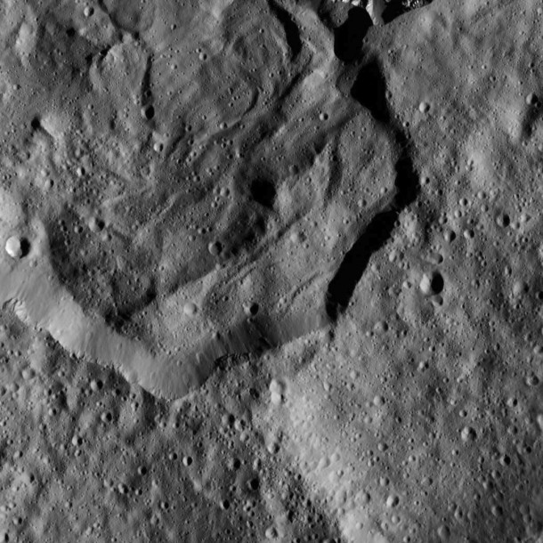 This image from NASA's Dawn spacecraft shows part of Messor Crater (25 miles or 40 kilometers, wide), located at northern mid-latitudes on Ceres. Image Credit: NASA/JPL-Caltech/UCLA/MPS/DLR/IDA This image from NASA's Dawn spacecraft shows part of Messor Crater (25 miles or 40 kilometers, wide), located at northern mid-latitudes on Ceres. Image Credit: NASA/JPL-Caltech/UCLA/MPS/DLR/IDA
