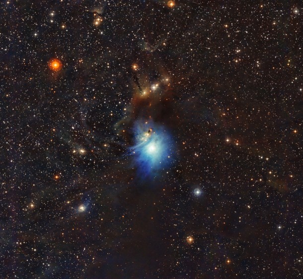 A newly formed star lights up the surrounding cosmic clouds in this image from ESO’s La Silla Observatory in Chile. Dust particles in the vast clouds that surround the star HD 97300 diffuse its light, like a car headlight in enveloping fog, and create the reflection nebula IC 2631. Although HD 97300 is in the spotlight for now, the very dust that makes it so hard to miss heralds the birth of additional, potentially scene-stealing, future stars. Credit: ESO A newly formed star lights up the surrounding cosmic clouds in this image from ESO’s La Silla Observatory in Chile. Dust particles in the vast clouds that surround the star HD 97300 diffuse its light, like a car headlight in enveloping fog, and create the reflection nebula IC 2631. Although HD 97300 is in the spotlight for now, the very dust that makes it so hard to miss heralds the birth of additional, potentially scene-stealing, future stars. Credit: ESO