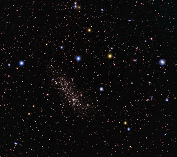 Figure 2: Close-up view of the dwarf galaxy NGC 253-dw2. The closely packed red dots show that it is composed of individual stars. (Image credit: Copyright © 2015 R. Jay GaBany (Cosmotography.com), Zachary Jennings (University of California, Santa Cruz), and National Astronomical Observatory of Japan (NAOJ)). Figure 2: Close-up view of the dwarf galaxy NGC 253-dw2. The closely packed red dots show that it is composed of individual stars. (Image credit: Copyright © 2015 R. Jay GaBany (Cosmotography.com), Zachary Jennings (University of California, Santa Cruz), and National Astronomical Observatory of Japan (NAOJ)).