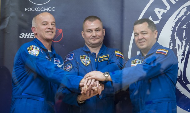 Expedition 47 crew members Flight Engineer Jeff Williams of NASA, Soyuz Commander Alexey Ovchinin of the Russian space agency Roscosmos, and Flight Engineer Oleg Skripochka of Roscosmos pose for a photo at the conclusion of a press conference on Thursday, March 17, 2016, at the Cosmonaut Hotel in Baikonur, Kazakhstan. Credits: NASA/Aubrey Gemignani Expedition 47 crew members Flight Engineer Jeff Williams of NASA, Soyuz Commander Alexey Ovchinin of the Russian space agency Roscosmos, and Flight Engineer Oleg Skripochka of Roscosmos pose for a photo at the conclusion of a press conference on Thursday, March 17, 2016, at the Cosmonaut Hotel in Baikonur, Kazakhstan. Credits: NASA/Aubrey Gemignani