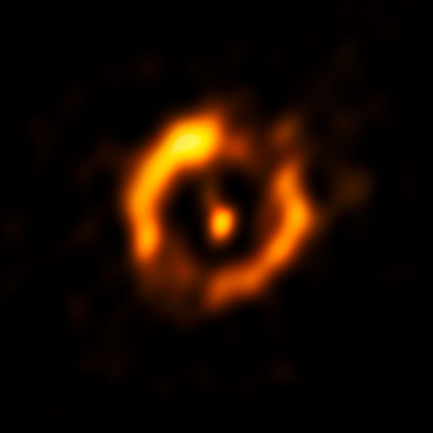 This view shows the VLTI reconstructed image, with the brighter central star removed. A fainter glow from the secondary star is visible, which came as a surprise to the observers. Credit: ESO This view shows the VLTI reconstructed image, with the brighter central star removed. A fainter glow from the secondary star is visible, which came as a surprise to the observers. Credit: ESO
