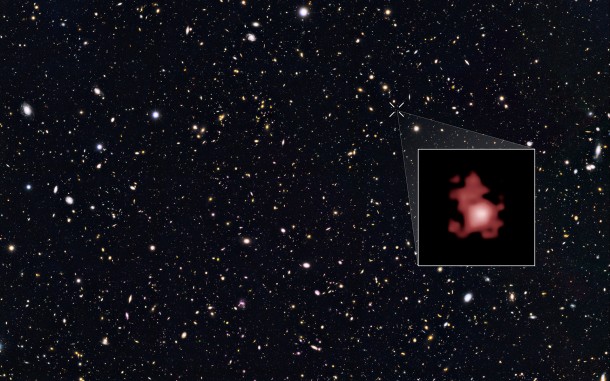 This image shows the position of the most distant galaxy discovered so far within a deep sky Hubble Space Telescope survey called GOODS North (Great Observatories Origins Deep Survey North). The survey field contains tens of thousands of galaxies stretching far back into time. Credit: NASA, ESA, and P. Oesch (Yale University) This image shows the position of the most distant galaxy discovered so far within a deep sky Hubble Space Telescope survey called GOODS North (Great Observatories Origins Deep Survey North). The survey field contains tens of thousands of galaxies stretching far back into time. Credit: NASA, ESA, and P. Oesch (Yale University)