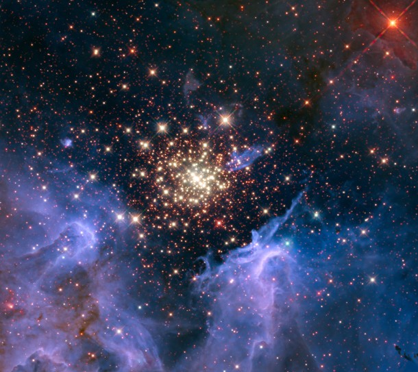 A cluster of massive stars seen with the Hubble Space Telescope. The cluster is surrounded by clouds of interstellar gas and dust called a nebula. The nebula, located 20,000 light-years away in the constellation Carina, contains the central cluster of huge, hot stars, called NGC 3603. Credits: NASA/U. Virginia/INAF, Bologna, Italy/USRA/Ames/STScI/AURA A cluster of massive stars seen with the Hubble Space Telescope. The cluster is surrounded by clouds of interstellar gas and dust called a nebula. The nebula, located 20,000 light-years away in the constellation Carina, contains the central cluster of huge, hot stars, called NGC 3603. Credits: NASA/U. Virginia/INAF, Bologna, Italy/USRA/Ames/STScI/AURA