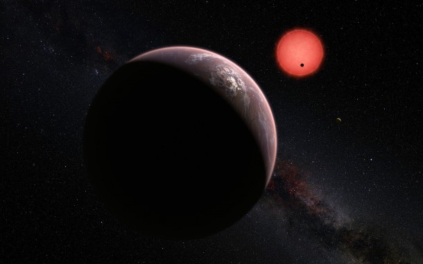 In this view one of the inner planets is seen in transit across the disc of its tiny and dim parent star. Credit: ESO/M. Kornmesser/N. Risinger (skysurvey.org) In this view one of the inner planets is seen in transit across the disc of its tiny and dim parent star. Credit: ESO/M. Kornmesser/N. Risinger (skysurvey.org)