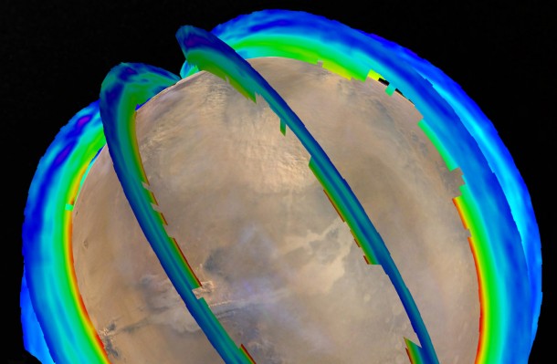 This graphic presents Martian atmospheric temperature data as curtains over an image of Mars taken during a regional dust storm. The temperature profiles extend from the surface to about 50 miles up. Temperatures are color coded, from minus 243 degrees Fahrenheit (purple) to minus 9 F (red). This graphic presents Martian atmospheric temperature data as curtains over an image of Mars taken during a regional dust storm. The temperature profiles extend from the surface to about 50 miles up. Temperatures are color coded, from minus 243 degrees Fahrenheit (purple) to minus 9 F (red).