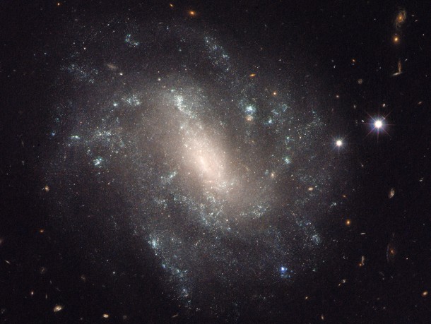 This Hubble Space Telescope image shows one of the galaxies in the survey to refine the measurement for how fast the universe expands with time, called the Hubble constant. Credits: NASA, ESA and A. Riess (STScI/JHU) This Hubble Space Telescope image shows one of the galaxies in the survey to refine the measurement for how fast the universe expands with time, called the Hubble constant. Credits: NASA, ESA and A. Riess (STScI/JHU)