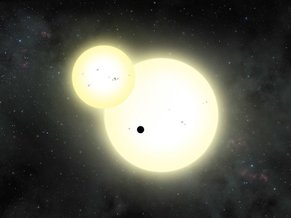 Artist's impression of the simultaneous stellar eclipse and planetary transit events on Kepler-1647. Credits: Lynette Cook Artist's impression of the simultaneous stellar eclipse and planetary transit events on Kepler-1647. Credits: Lynette Cook