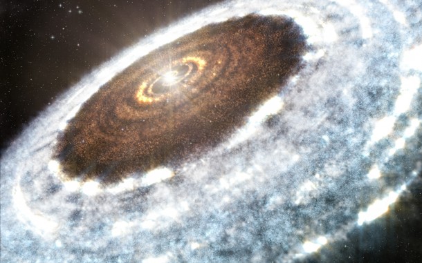 This artist’s impression of the water snowline around the young star V883 Orionis, as detected with ALMA. Credit: A. Angelich (NRAO/AUI/NSF)/ALMA (ESO/NAOJ/NRAO) This artist’s impression of the water snowline around the young star V883 Orionis, as detected with ALMA. Credit: A. Angelich (NRAO/AUI/NSF)/ALMA (ESO/NAOJ/NRAO)