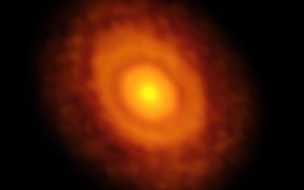 This image of the planet-forming disc around the young star V883 Orionis was obtained by ALMA in long-baseline mode. This star is currently in outburst, which has pushed the water snow line further from the star and allowed it to be detected for the first time. The dark ring midway through the disc is the water snowline, the point from the star where the temperature and pressure dip low enough for water ice to form. Credit: ALMA (ESO/NAOJ/NRAO)/L. Cieza This image of the planet-forming disc around the young star V883 Orionis was obtained by ALMA in long-baseline mode. This star is currently in outburst, which has pushed the water snow line further from the star and allowed it to be detected for the first time. The dark ring midway through the disc is the water snowline, the point from the star where the temperature and pressure dip low enough for water ice to form. Credit: ALMA (ESO/NAOJ/NRAO)/L. Cieza