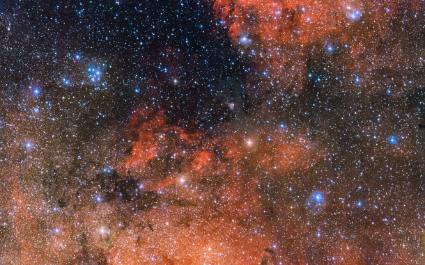 The small smattering of bright blue stars upper left of centre in this huge 615 megapixel ESO image is the perfect cosmic laboratory in which to study the life and death of stars. Known as Messier 18 this open star cluster contains stars that formed together from the same massive cloud of gas and dust. This image was captured by the OmegaCAM camera attached to the VLT Survey Telescope (VST) located at ESO’s Paranal Observatory in Chile. Credit: ESO The small smattering of bright blue stars upper left of centre in this huge 615 megapixel ESO image is the perfect cosmic laboratory in which to study the life and death of stars. Known as Messier 18 this open star cluster contains stars that formed together from the same massive cloud of gas and dust. This image was captured by the OmegaCAM camera attached to the VLT Survey Telescope (VST) located at ESO’s Paranal Observatory in Chile. Credit: ESO