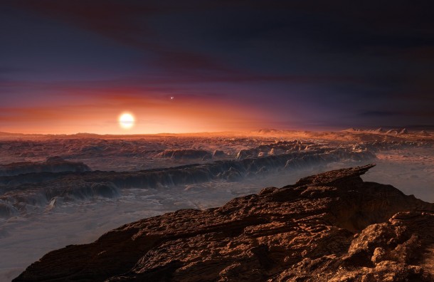 This artist’s impression shows a view of the surface of the planet Proxima b orbiting the red dwarf star Proxima Centauri, the closest star to the Solar System. The double star Alpha Centauri AB also appears in the image to the upper-right of Proxima itself. Proxima b is a little more massive than the Earth and orbits in the habitable zone around Proxima Centauri, where the temperature is suitable for liquid water to exist on its surface. Credit: ESO/M. Kornmesser This artist’s impression shows a view of the surface of the planet Proxima b orbiting the red dwarf star Proxima Centauri, the closest star to the Solar System. The double star Alpha Centauri AB also appears in the image to the upper-right of Proxima itself. Proxima b is a little more massive than the Earth and orbits in the habitable zone around Proxima Centauri, where the temperature is suitable for liquid water to exist on its surface. Credit: ESO/M. Kornmesser